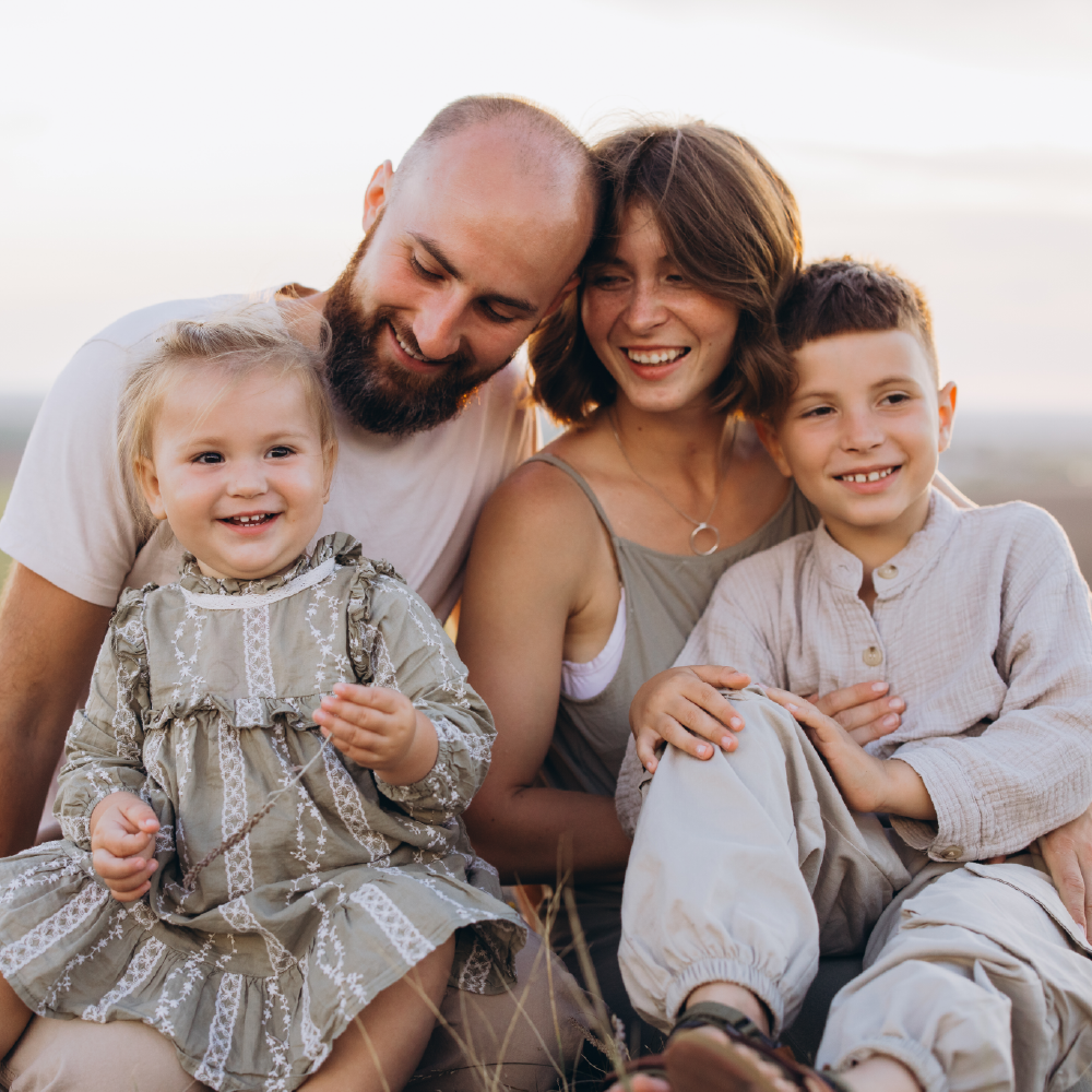 Married couple with kids planning their family’s future together